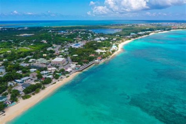Can Dependants work in Cayman Islands?