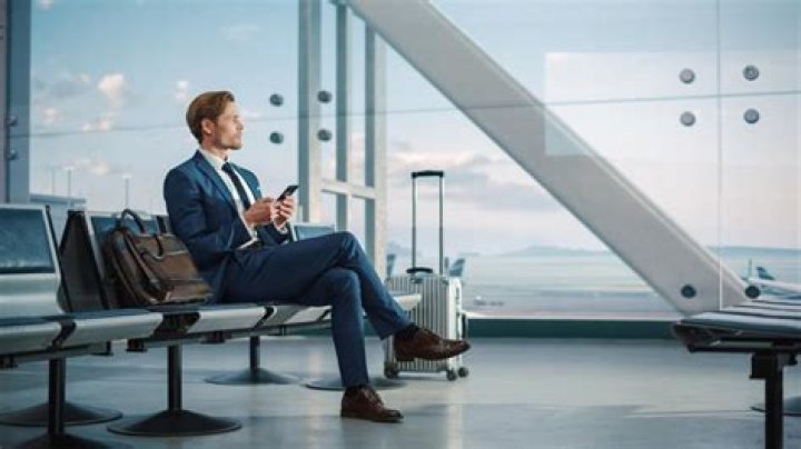 Can spouses go on business trips?