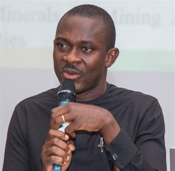 How are resident and non resident persons taxed in Ghana?