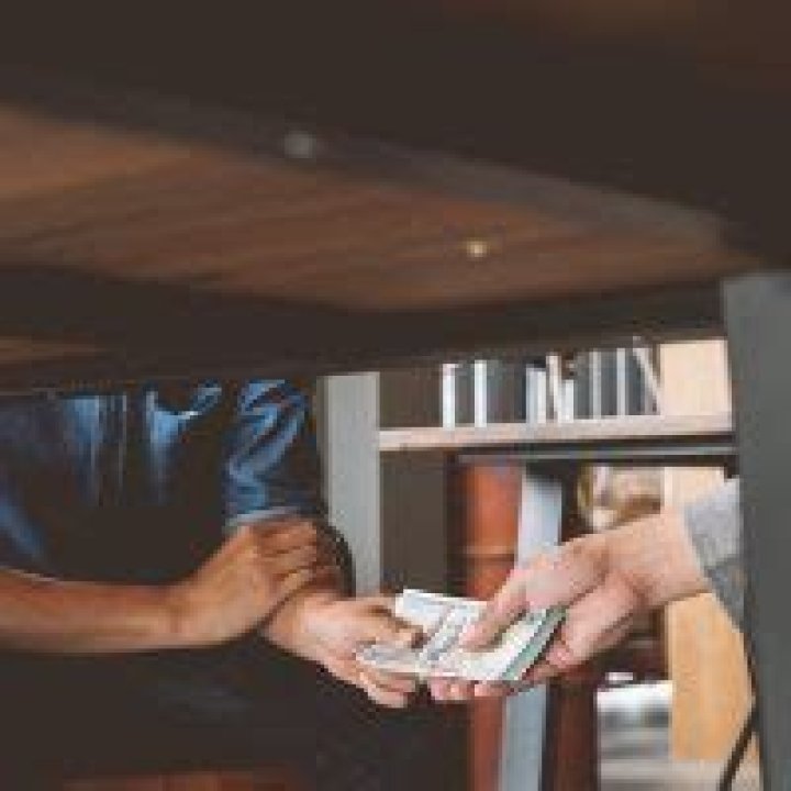 Is paying employees off the books illegal?