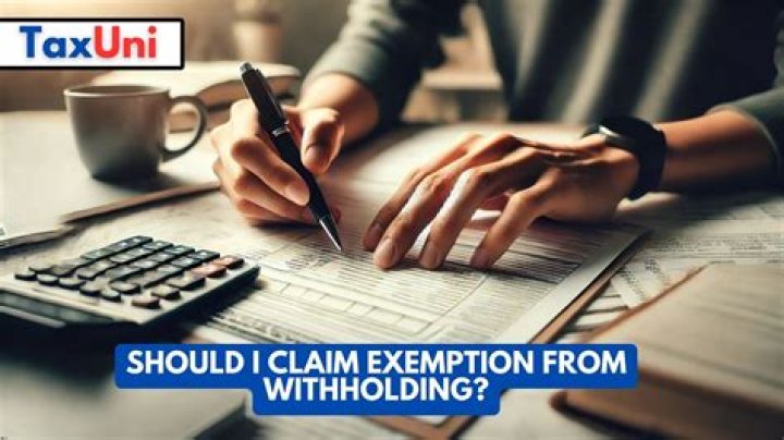 What does it mean to claim complete exemption from withholding?