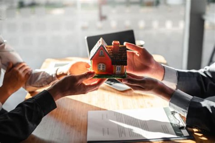 What is a loan secured by real estate?