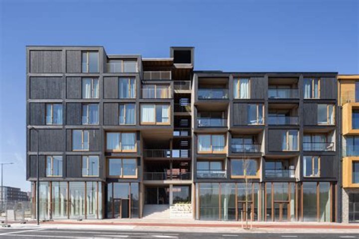 What is the owner of an apartment building called?