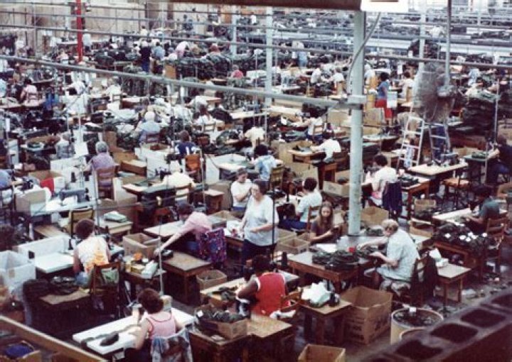 Who usually works in sweatshops?